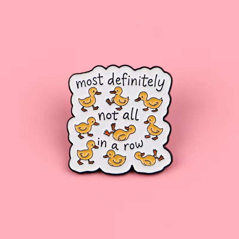 Ducks in a Row Enamel Pin