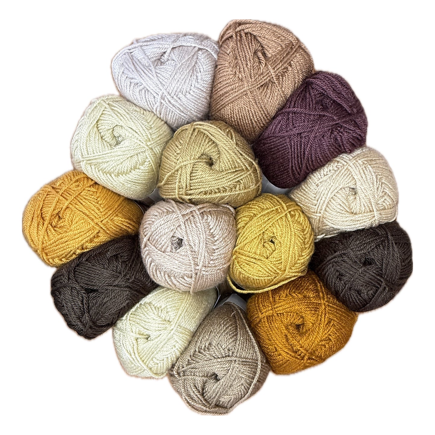 Patchwork with Busyfingers Amber & Earth Yarn Set, 100% anti-pilling acrylic in warm earth tones: cream, tan, gold, mustard, brown, and plum.