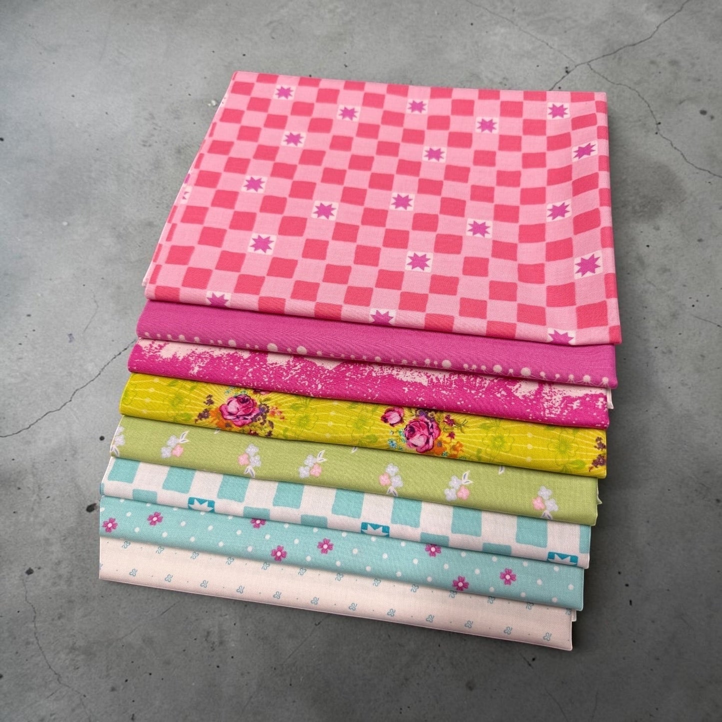 Patchwork with Busyfingers Juicy Burst 8pc cotton fabric bundle featuring vibrant floral and geometric prints.