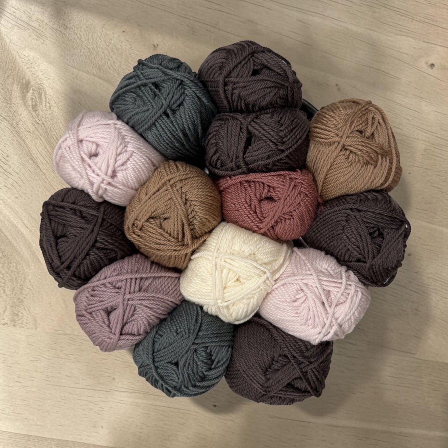 Patchwork with Busyfingers Mossfield Meadow Wool Yarn Set in muted earth tones: rock, toffee, beige, moss, cream, emme, and musk.