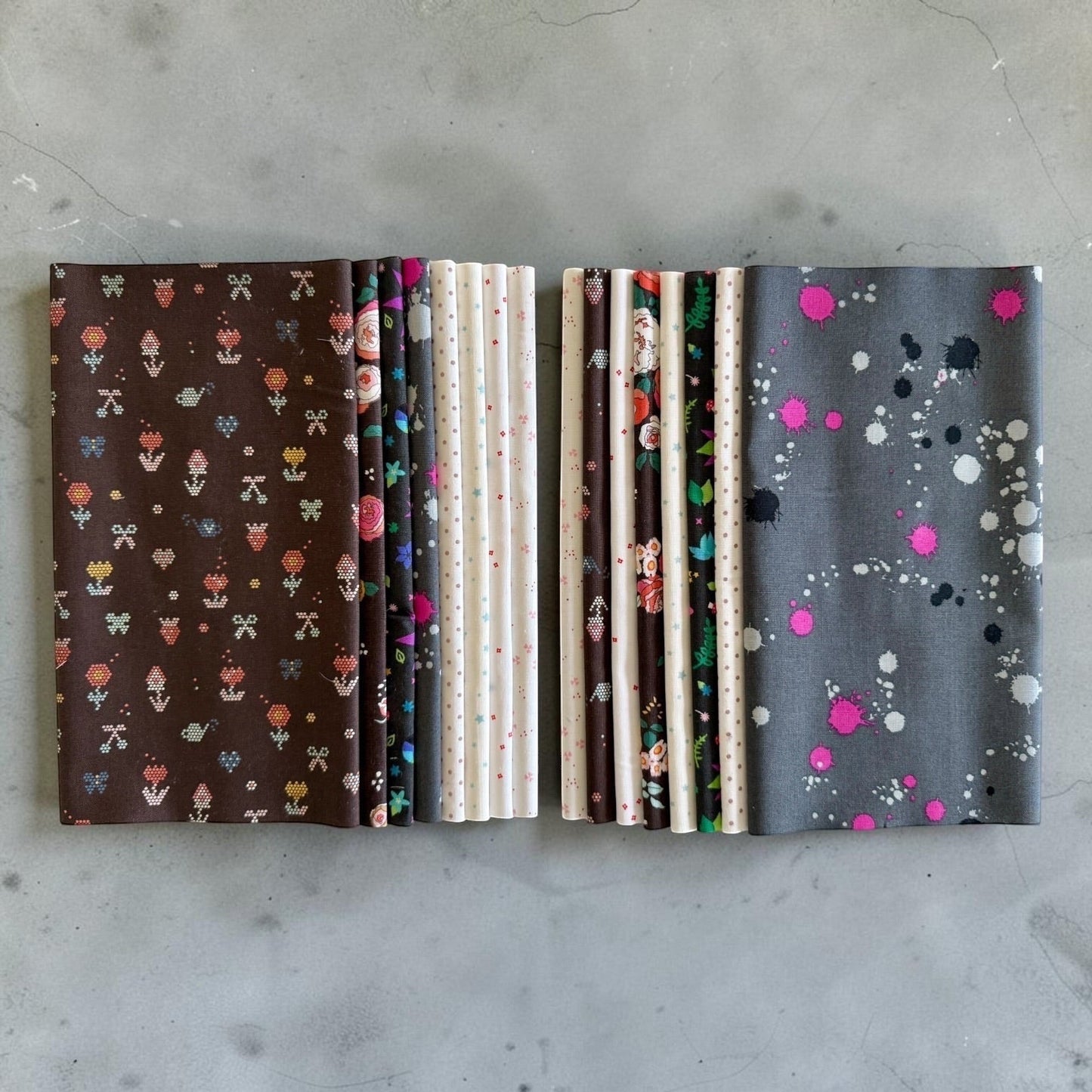 Patchwork with Busyfingers Slate & Granite fat eighth cotton fabric pack featuring 8 assorted floral and splatter prints