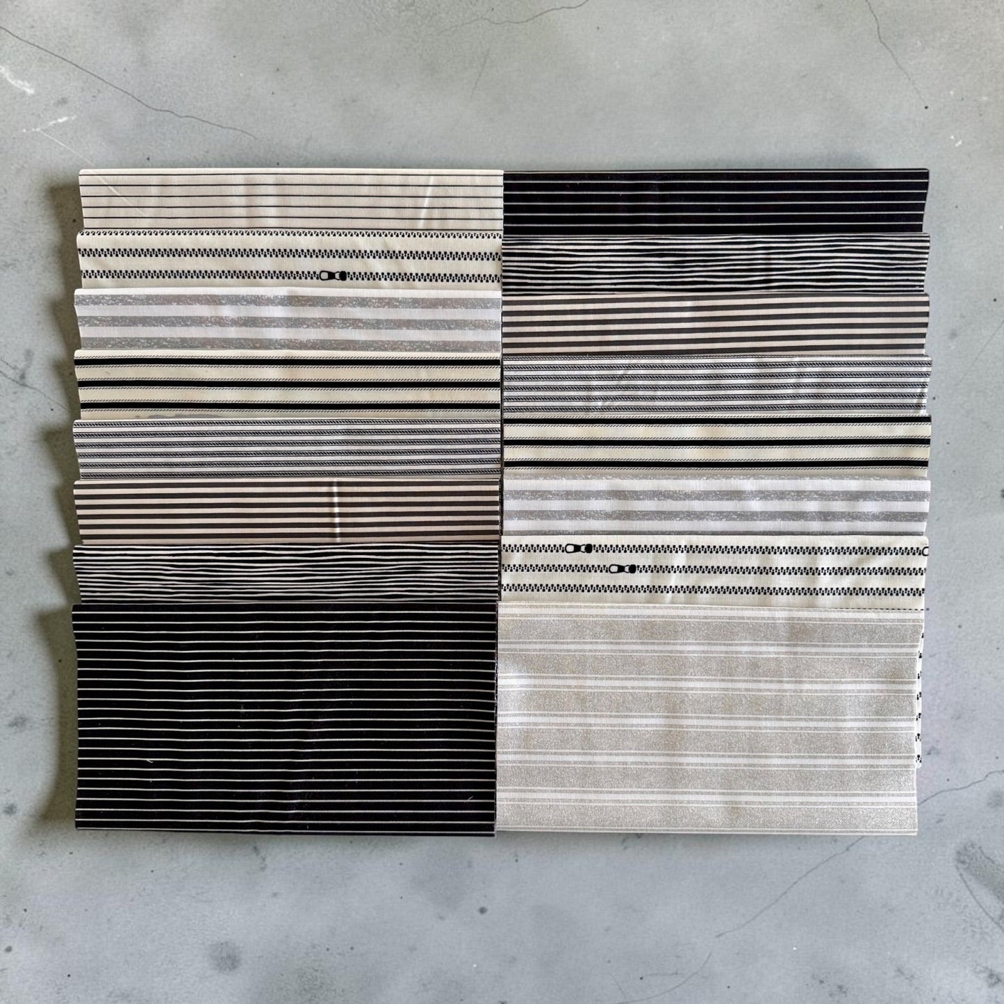 Patchwork with Busyfingers 8-piece fat eighth cotton fabric pack featuring assorted black, white, and grey stripe prints