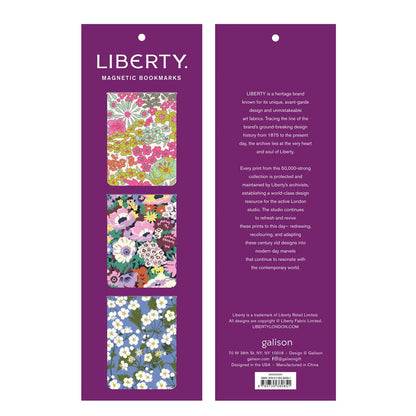 Patchwork with Busyfingers Liberty magnetic bookmarks featuring Margaret Annie, Thorpe and Mitsi floral prints on a purple background.