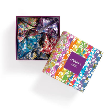 Patchwork with Busyfingers Liberty Classic Floral Origami Flower Kit with colourful floral patterned paper and folded origami flowers inside.