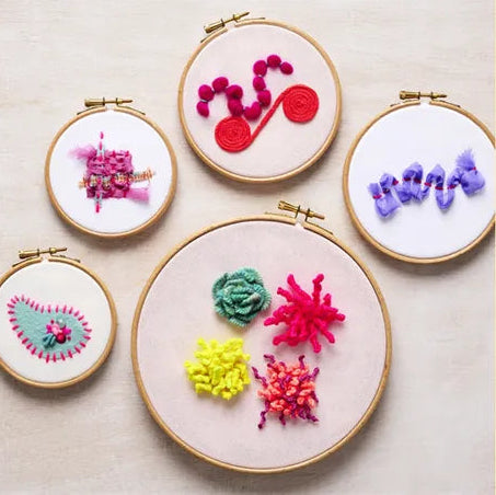 Patchwork with Busyfingers Creative Abstract Embroidery Book showing colourful textured embroidery hoops and techniques