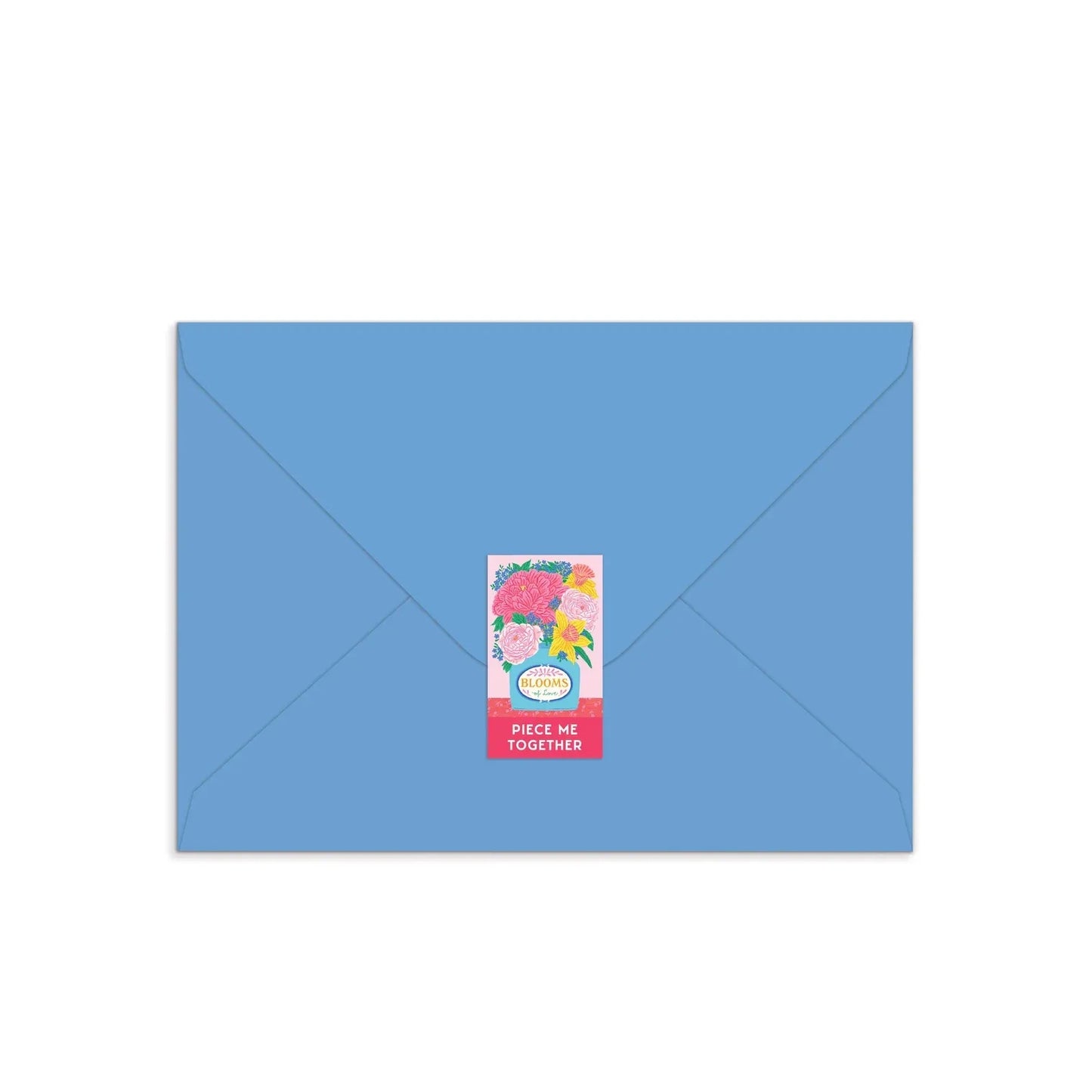 Patchwork with Busyfingers Blooms of Love greeting card puzzle on a blue envelope, featuring a sticker with a floral arrangement and the text "PIECE ME TOGETHER".