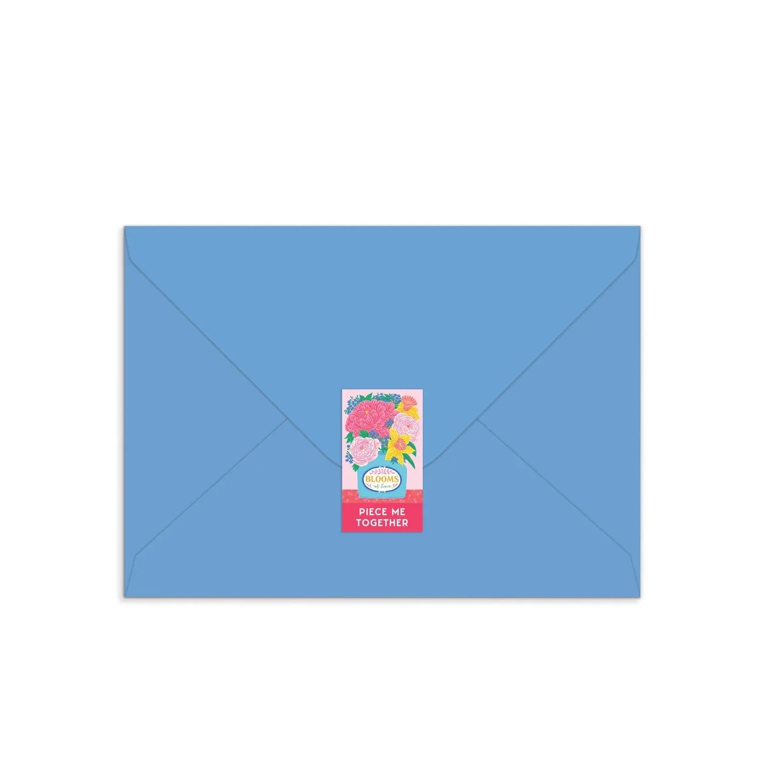 Patchwork with Busyfingers Blooms of Love greeting card puzzle on a blue envelope, featuring a sticker with a floral arrangement and the text "PIECE ME TOGETHER".