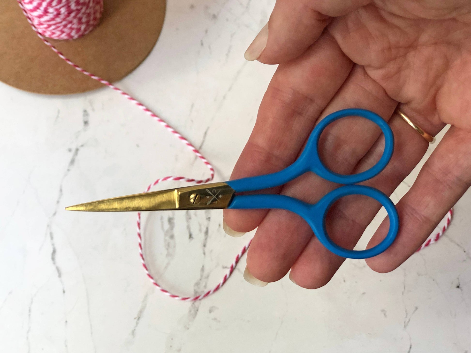 Patchwork with Busyfingers blue embroidery scissors with gold blades, perfect for cutting threads and delicate stitching.