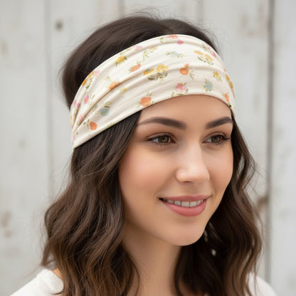 Patchwork with Busyfingers Boho Bandeau in cream with a ditsy floral print of pink, orange, and blue flowers. Versatile hair accessory.