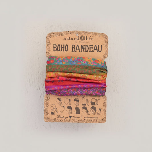 Patchwork with Busyfingers Boho Bandeau with rainbow borders and floral print in green, orange, pink, and purple. Versatile accessory for hair or wrist.