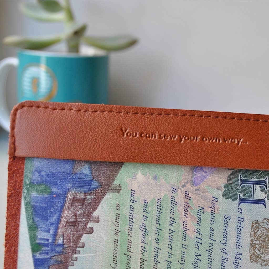 Patchwork with Busyfingers brown leather passport cover kit with world map design and embossed text.