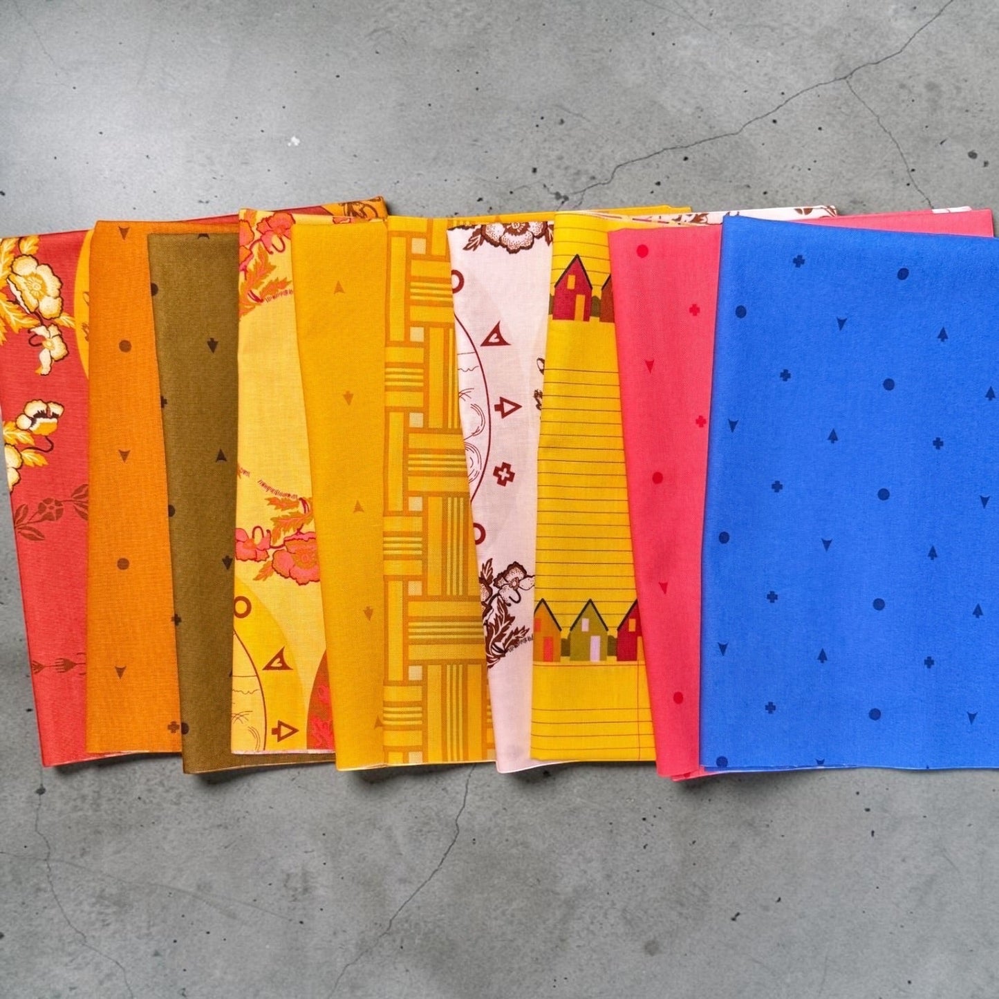 Patchwork with Busyfingers Camp Kitschy 10pc cotton fabric bundle featuring vibrant retro prints and geometric designs.