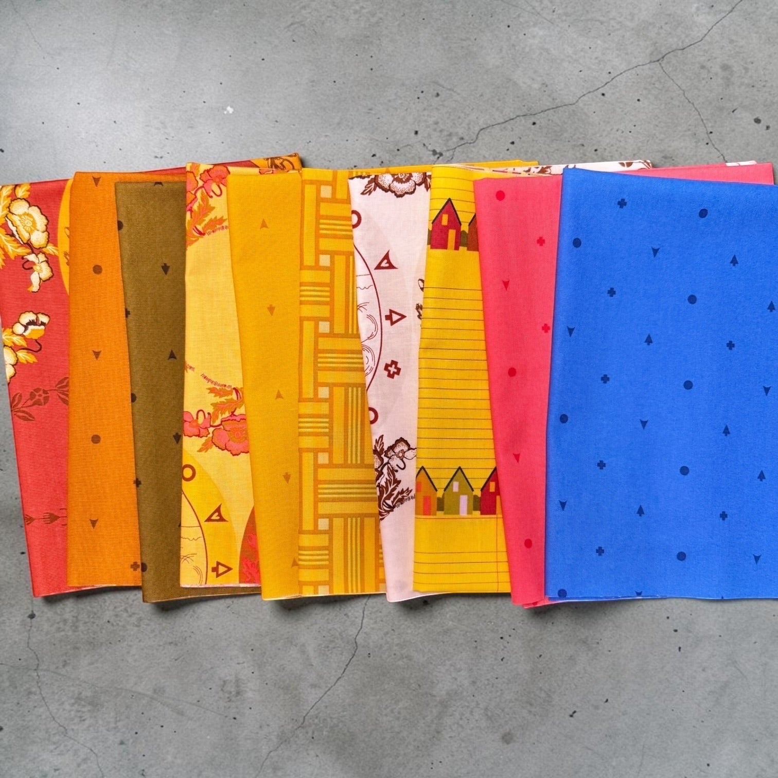 Patchwork with Busyfingers Camp Kitschy 10pc cotton fabric bundle featuring vibrant retro prints and geometric designs.