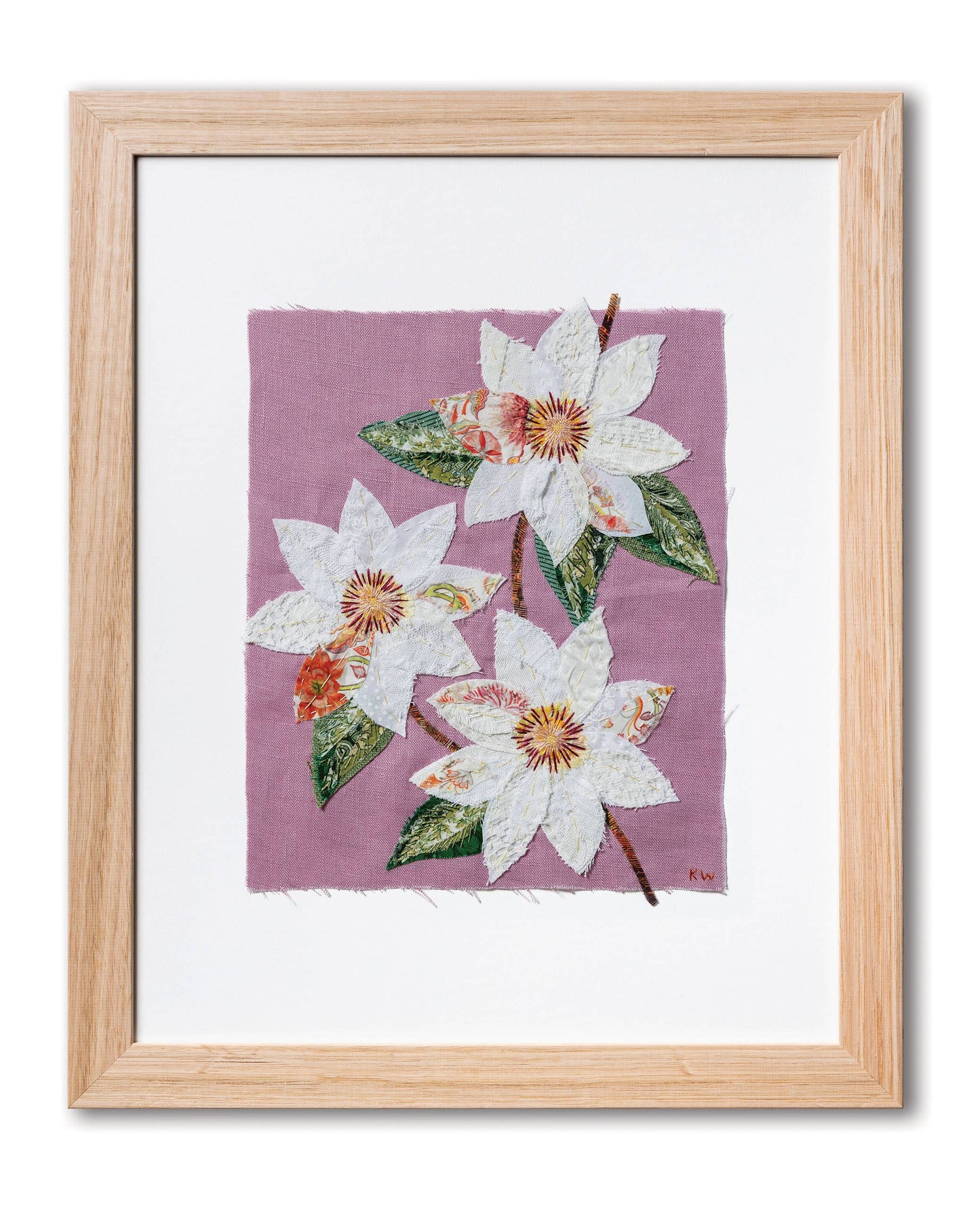 Patchwork with Busyfingers Clematis slow stitching kit featuring white fabric flowers on a pastel purple linen background