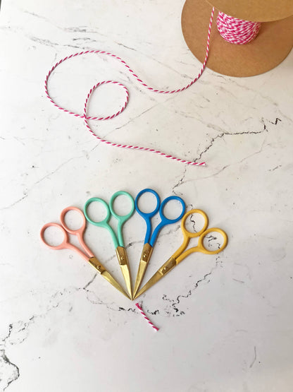 Patchwork with Busyfingers coloured embroidery scissors in yellow, blue, mint, and pink with gold blades. Stainless steel, sharp pointed blades for precision cutting.