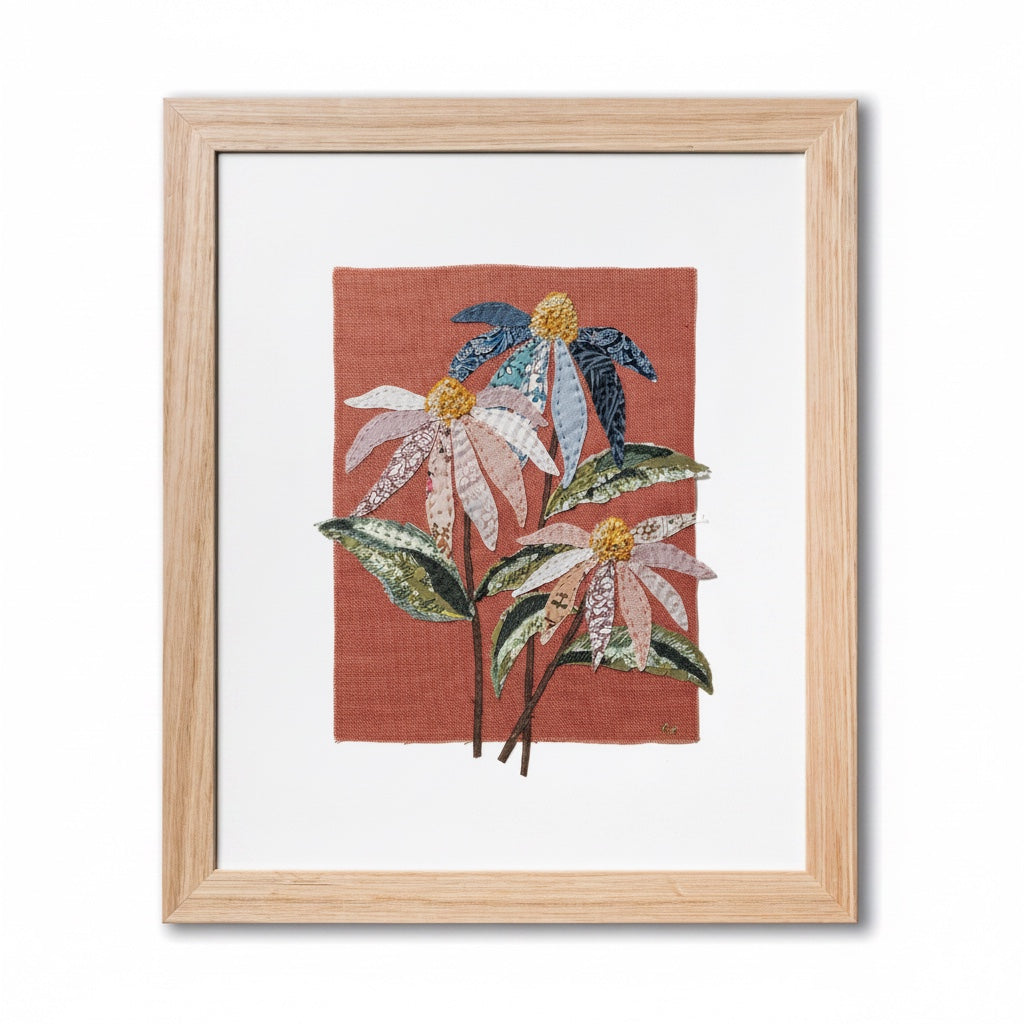 Patchwork with Busyfingers Coneflower slow stitching kit featuring fabric applique flowers on red clay linen canvas.