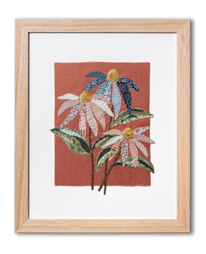 Patchwork with Busyfingers Coneflower slow stitching kit featuring pastel fabric flowers on red clay linen in a frame