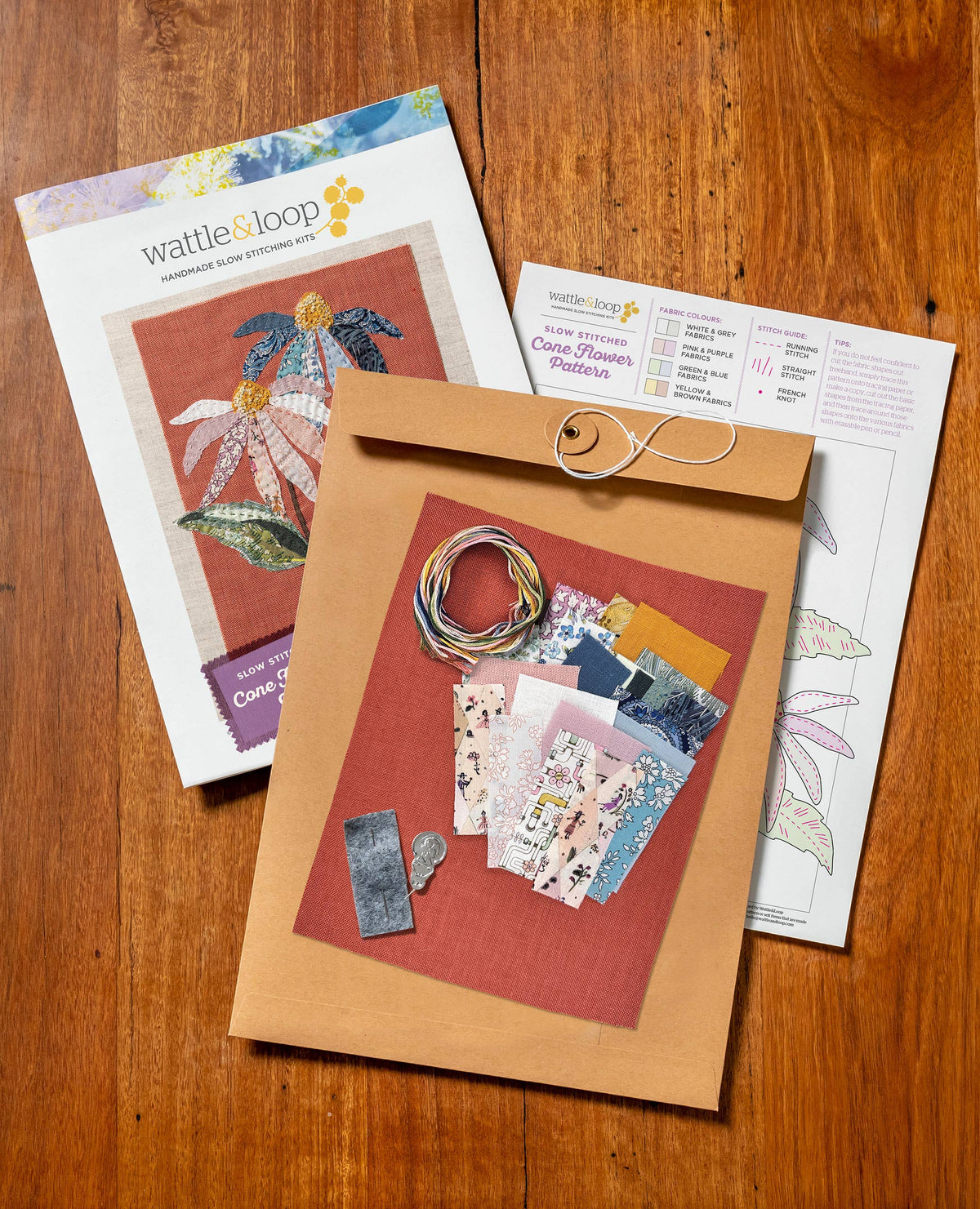 Patchwork with Busyfingers Coneflower Slow Stitching Kit with fabric scraps, embroidery thread, and pattern instructions.