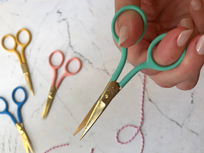 Patchwork with Busyfingers coral embroidery scissors with gold blades and pointed tips for precise thread cutting.