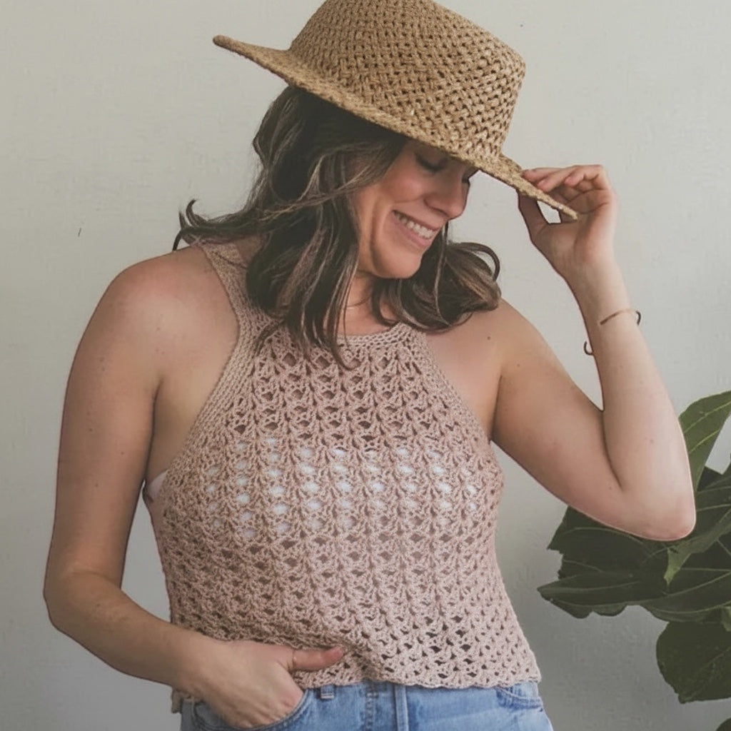 Patchwork with Busyfingers Crochet Layers to Love book featuring a model wearing a beige crochet halter top and hat.