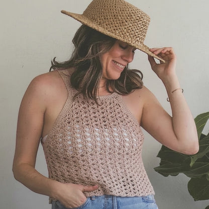 Patchwork with Busyfingers Crochet Layers to Love book featuring a model wearing a beige crochet halter top and hat.