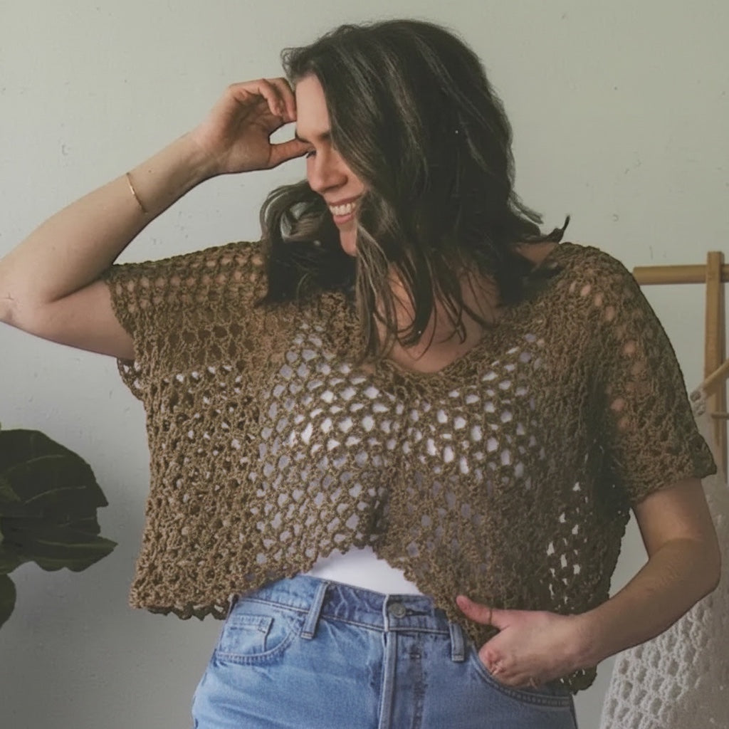 Woman wearing a brown open-weave crochet top from the Patchwork with Busyfingers Crochet Layers to Love book.