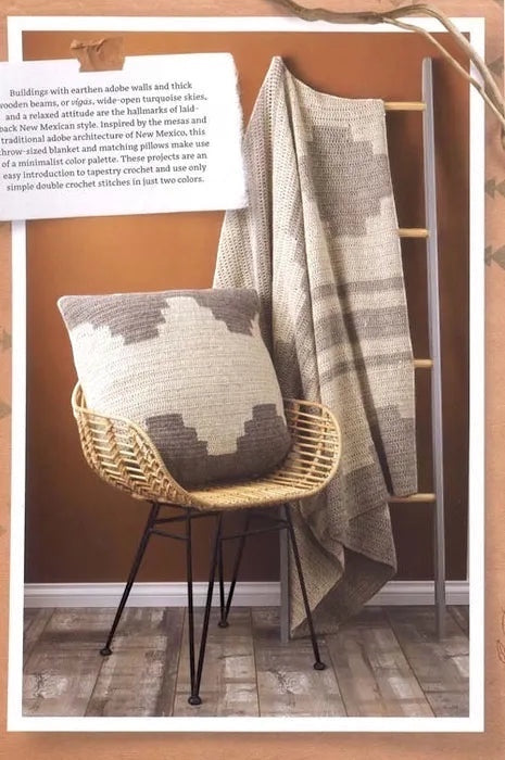 Patchwork with Busyfingers Crochet Southwest Spirit book featuring a bohemian crochet blanket and pillow on a chair.