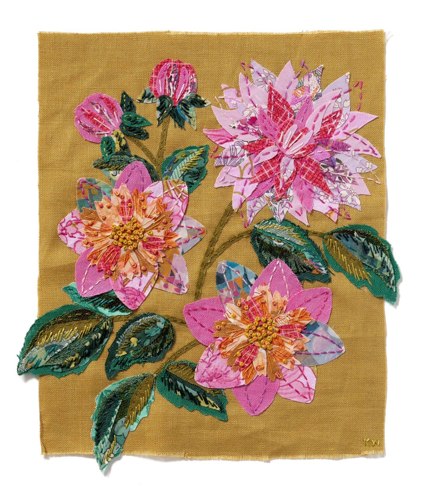 Patchwork with Busyfingers Dahlia slow stitching kit featuring fabric flowers in pink and terracotta on linen fabric.