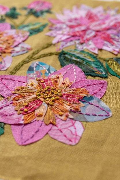 Patchwork with Busyfingers Dahlia slow stitching kit featuring fabric flowers in pink, mauve, and terracotta on linen.