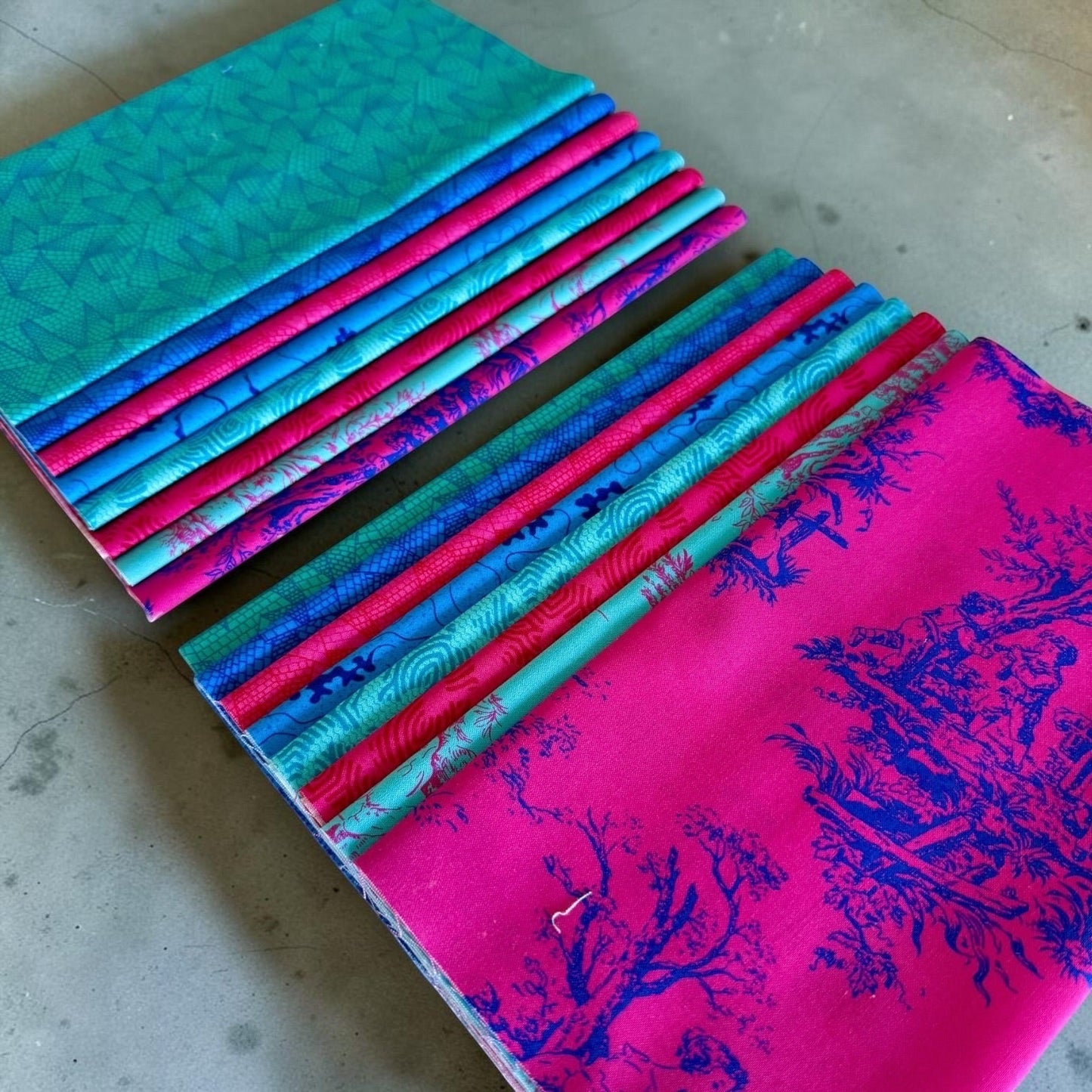 Patchwork with Busyfingers Electric Lagoon 100% cotton fat eighth fabric pack with 8 assorted vibrant blue and pink prints