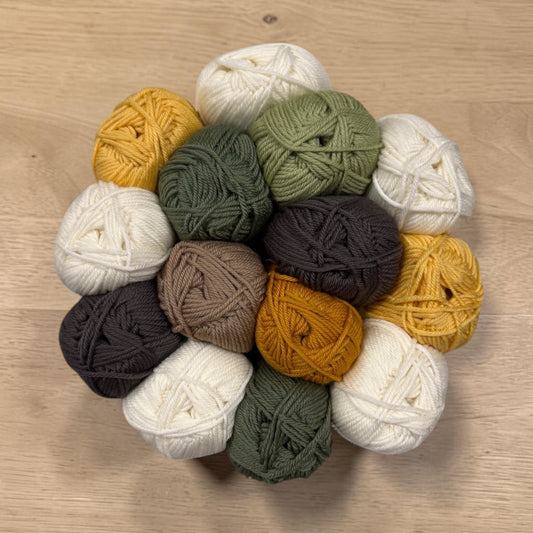 Patchwork with Busyfingers Eucalyptus Wool Yarn Set in cream, butter, rock, forest, mustard, leaf, and toffee. 100% Australian Merino wool.