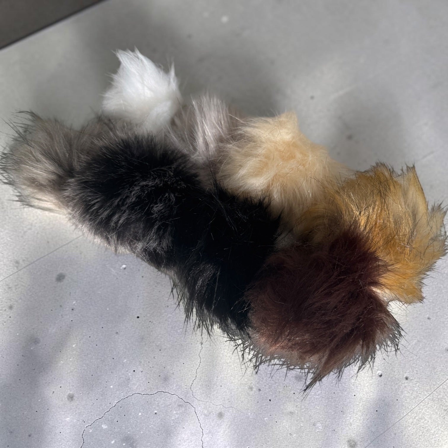Patchwork with Busyfingers plush faux fur pom poms in assorted natural colours for beanie hats