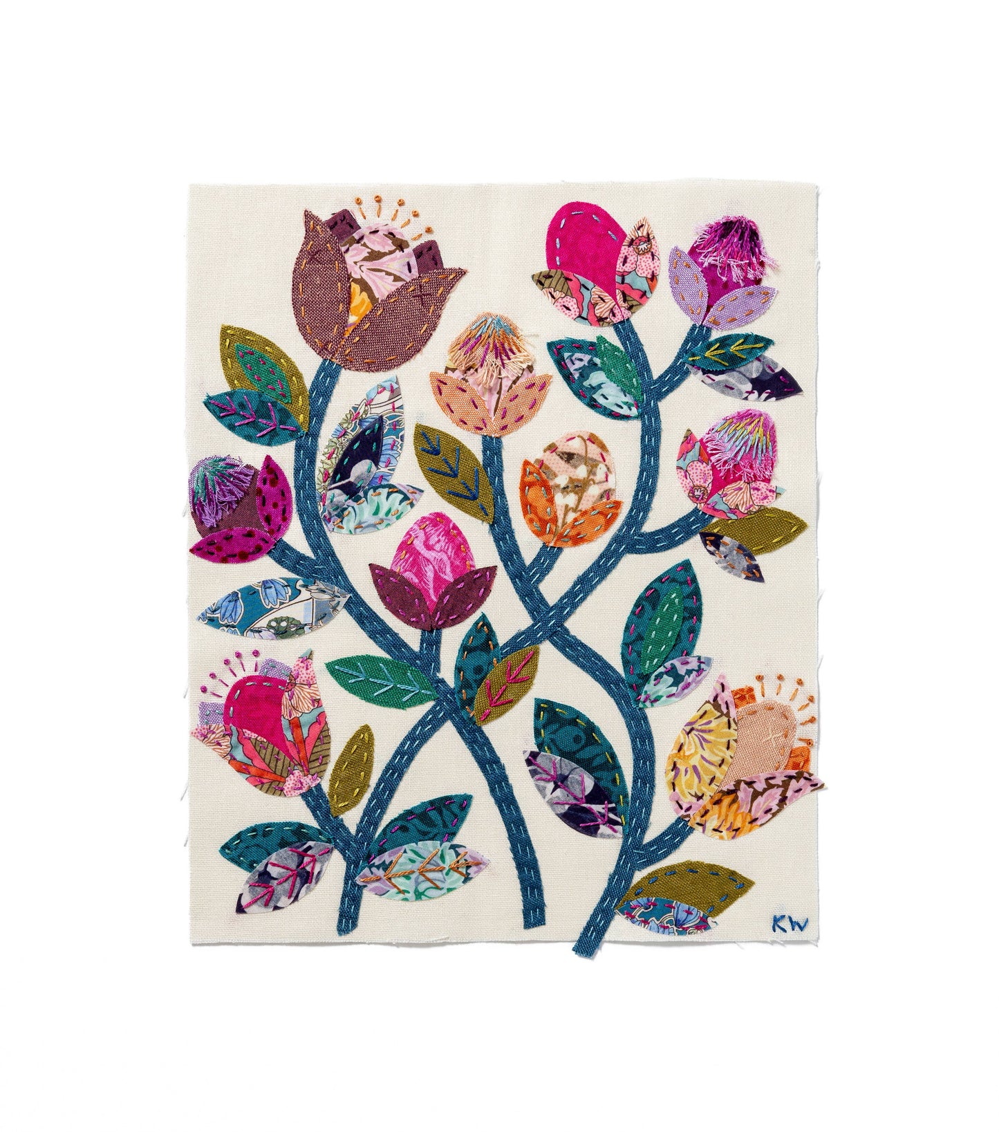 Patchwork with Busyfingers Folk Fleur slow stitching kit featuring vibrant floral fabric applique on linen background.