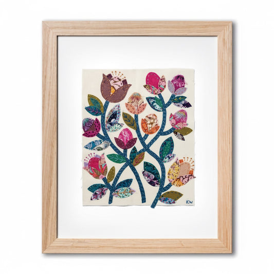 Patchwork with Busyfingers Folk Fleur slow stitching kit featuring vibrant floral fabric applique in a wooden frame.