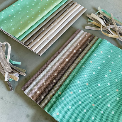 Patchwork with Busyfingers Forest Fog 100% cotton fat eighth fabric pack featuring 8 green and grey patterned prints.
