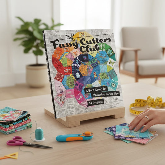 Patchwork with Busyfingers Fussy Cutters Club book by Angie Wilson, featuring 14 fabric projects and mastering fabric play.