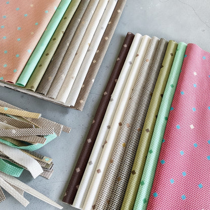 Patchwork with Busyfingers Garden Mist 100% cotton fabric fat eighth pack featuring 8 assorted patterned prints.