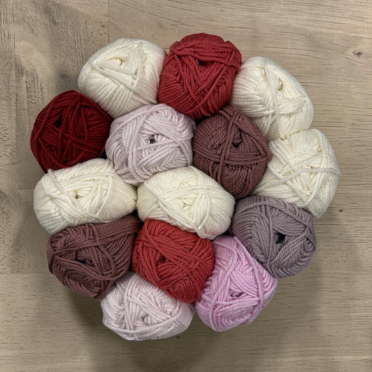 Patchwork with Busyfingers Heirloom Rose Wool Yarn Set, 28 balls of 100% Australian Merino wool in cream, coral, pink, and floral tones.