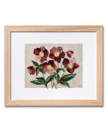 Patchwork with Busyfingers Hellebores slow stitching kit featuring burgundy floral fabric art in a light wood frame.