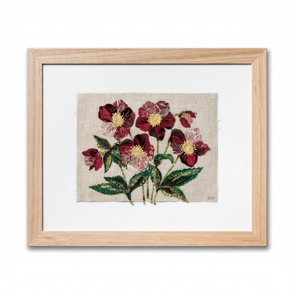 Patchwork with Busyfingers Hellebores slow stitching kit featuring burgundy floral embroidery on natural linen.