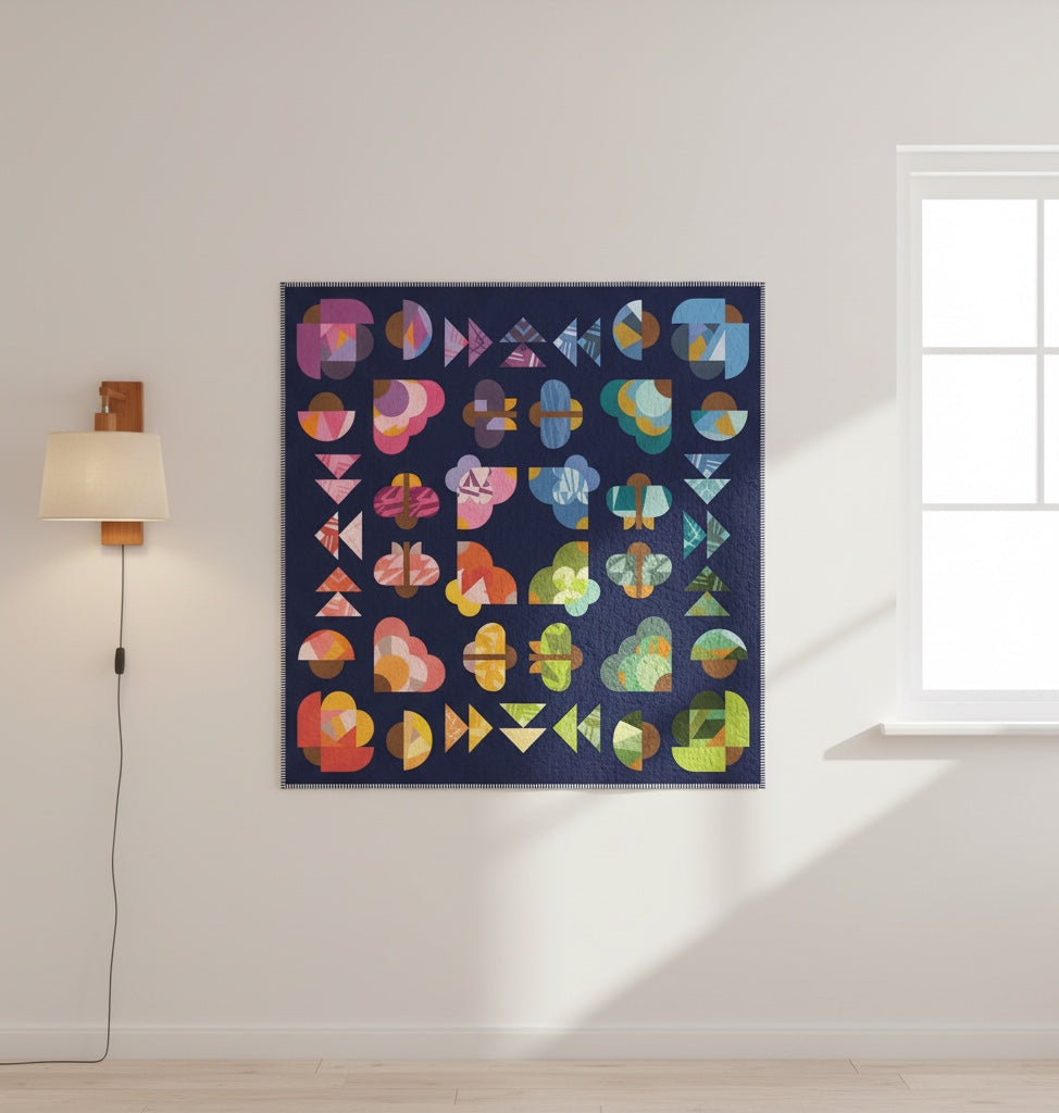 Patchwork with Busyfingers I Can Fly quilt featuring vibrant, curvy improv-style moth motifs on a dark blue background.