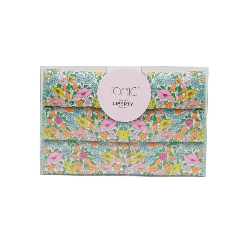 Patchwork with Busyfingers Liberty Tana Lawn cotton handkerchief set of 3, featuring floral prints in blue, pink, yellow, and orange.