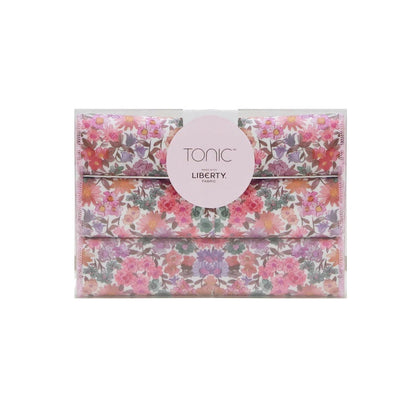 Patchwork with Busyfingers Liberty set of 3 floral print cotton handkerchiefs in pink, purple, and orange.
