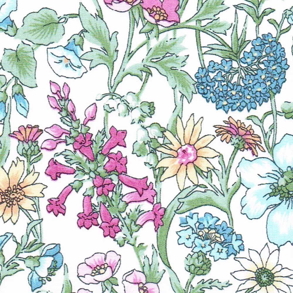 Patchwork with Busyfingers Jewellery Cube in Liberty Tana Lawn™ cotton with a vibrant floral print featuring pink, yellow, and blue flowers.