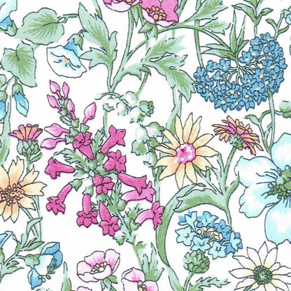 Patchwork with Busyfingers Jewellery Cube in Liberty Tana Lawn™ cotton with a vibrant floral print featuring pink, yellow, and blue flowers.