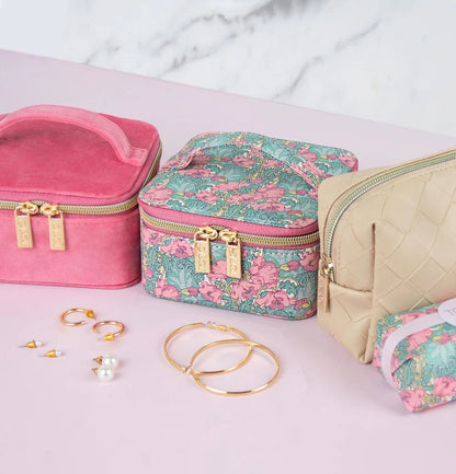 Patchwork with Busyfingers Liberty floral print jewellery cube with pink velvet and beige woven cases. Includes gold hoop earrings and pearl studs.