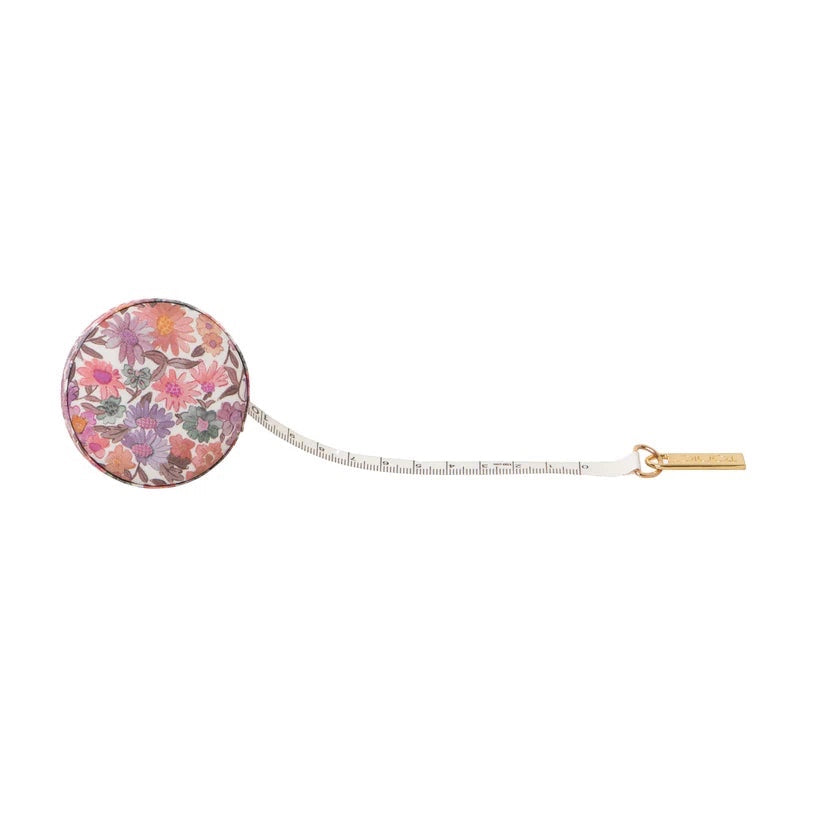 Patchwork with Busyfingers Liberty Tana Lawn cotton measuring tape with floral print and gold tab. 150cm tape.