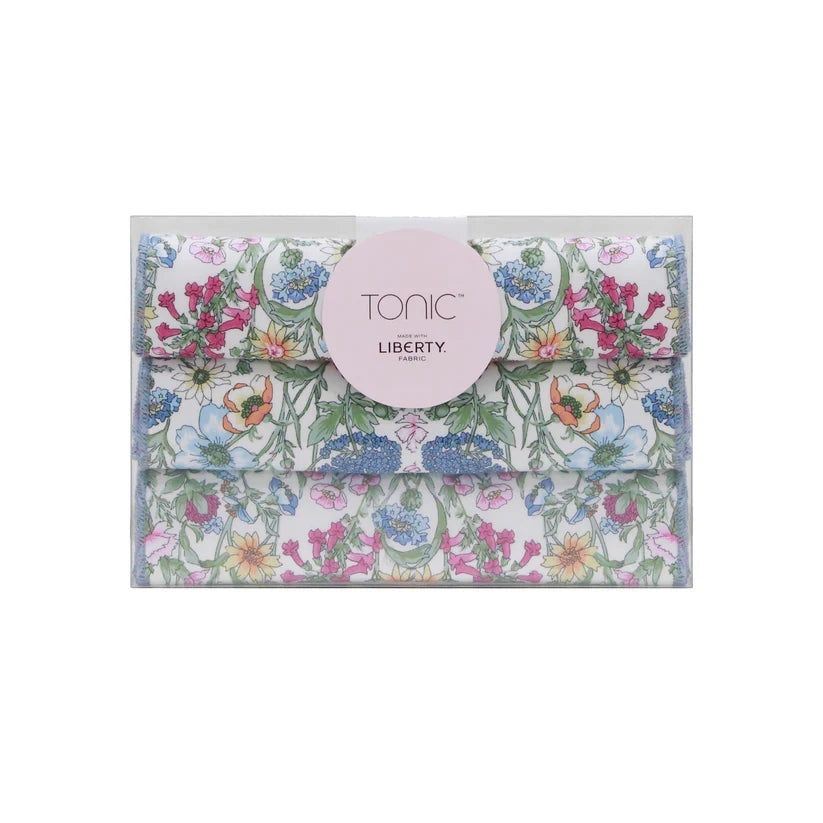 Patchwork with Busyfingers Liberty Tana Lawn cotton handkerchief set of 3, featuring floral prints in blue, pink, and yellow with overlocked edges.
