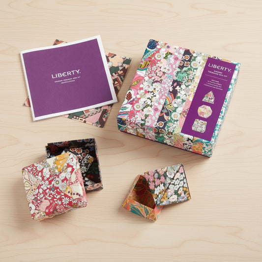 Patchwork with Busyfingers Liberty Origami Treasure Box Kit with floral print paper, instructions, and finished boxes.