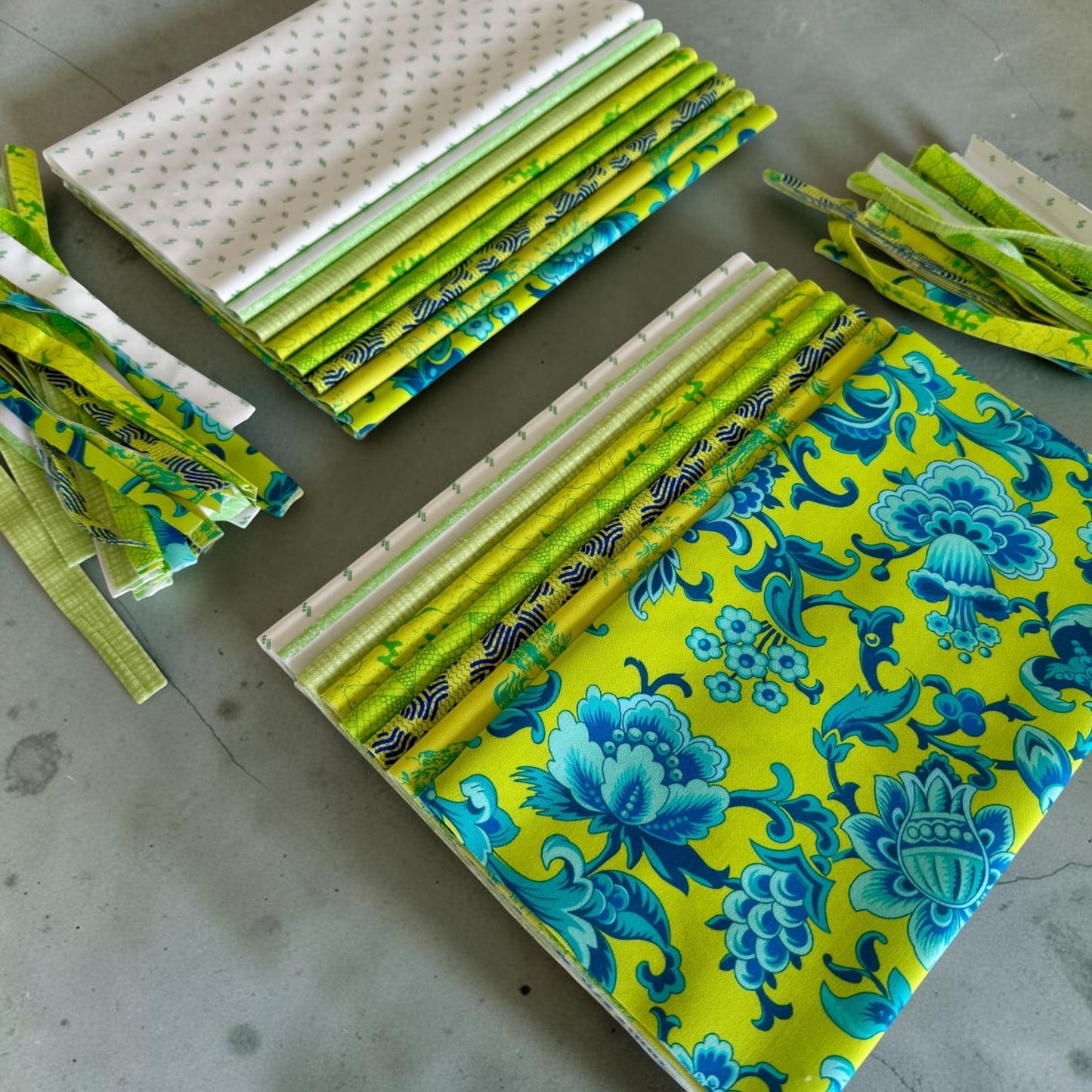 Patchwork with Busyfingers Lime Sorbet 8-piece fat eighth cotton fabric pack with assorted green and blue floral prints